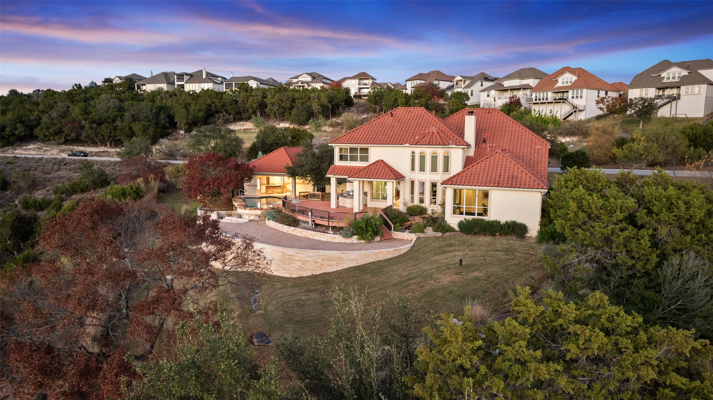 2906 Lakehurst Road Spicewood, TX 78669 - Photo 32 of 40 a view of a town with swimming pool and mountain view