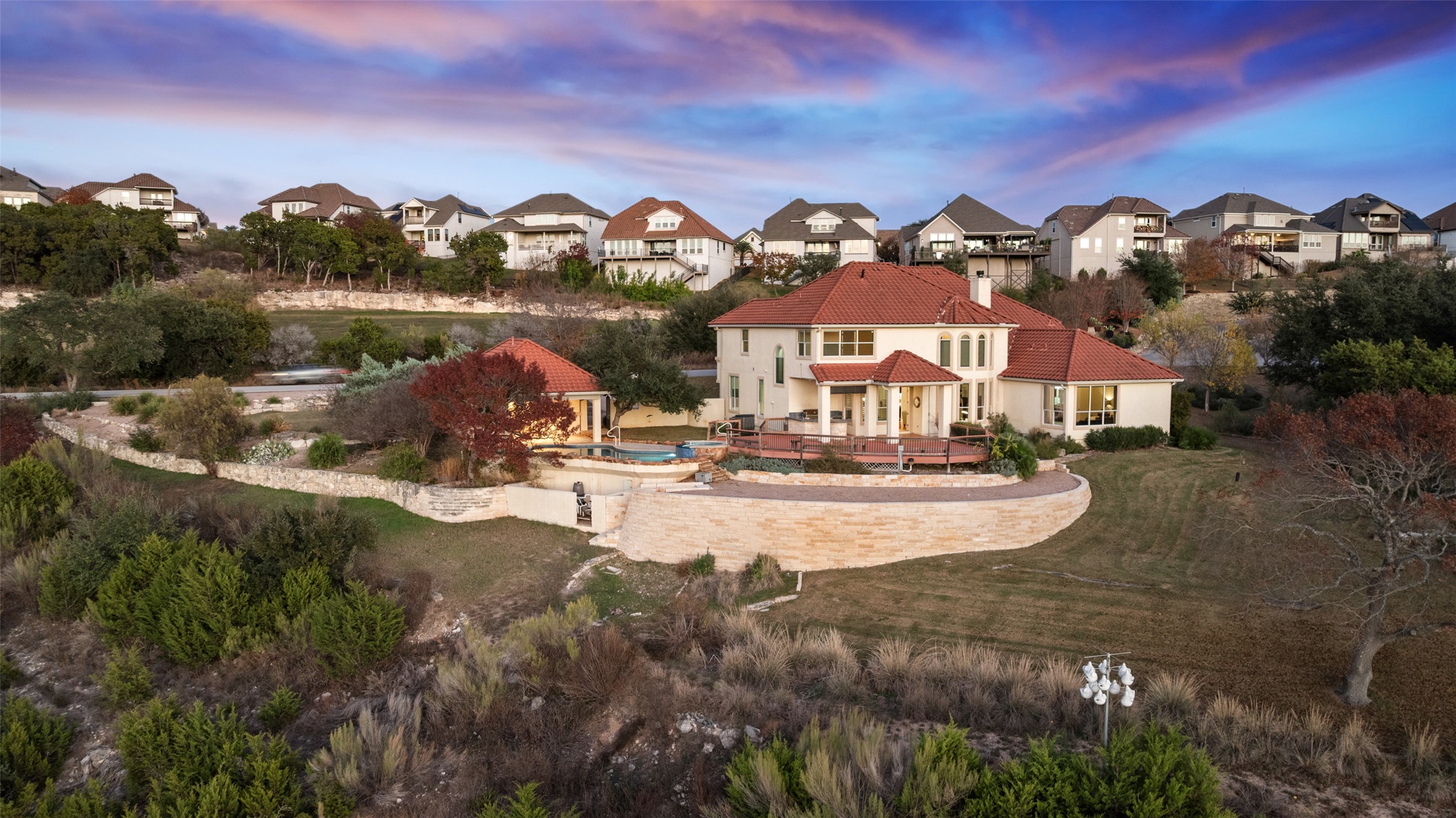 2906 Lakehurst Road Spicewood, TX 78669 - Photo 35 of 40 a view of a town with mountains in the background