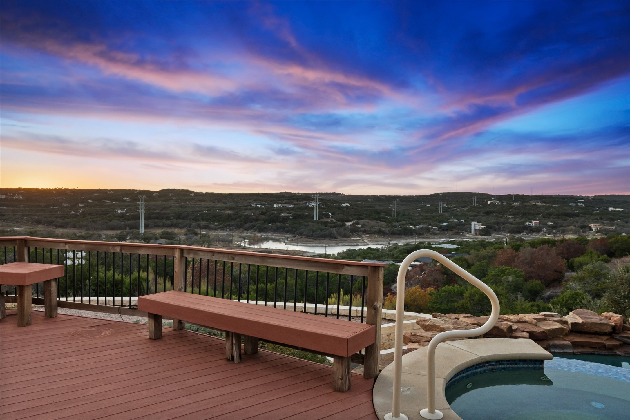 2906 Lakehurst Road Spicewood, TX 78669 - Photo 36 of 40 a view of a roof deck with couches and sky view