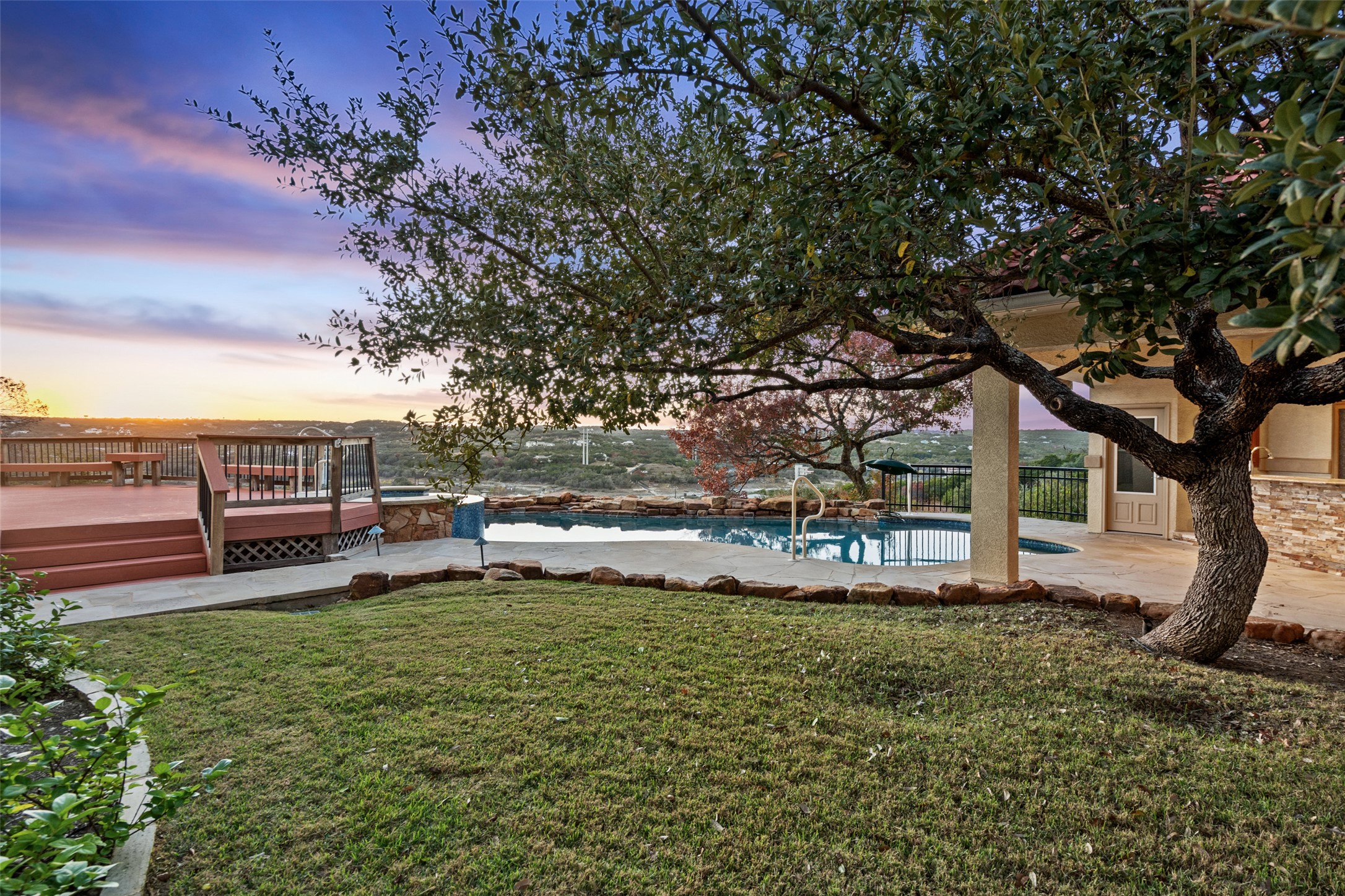 2906 Lakehurst Road Spicewood, TX 78669 - Photo 39 of 40 a view of a house with backyard