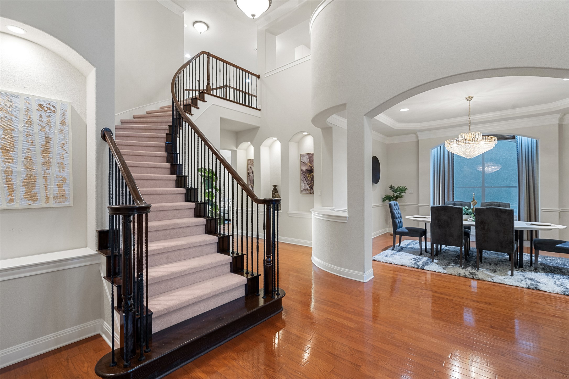 2906 Lakehurst Road Spicewood, TX 78669 - Photo 5 of 40 a view of a hallway with furniture and wooden floor
