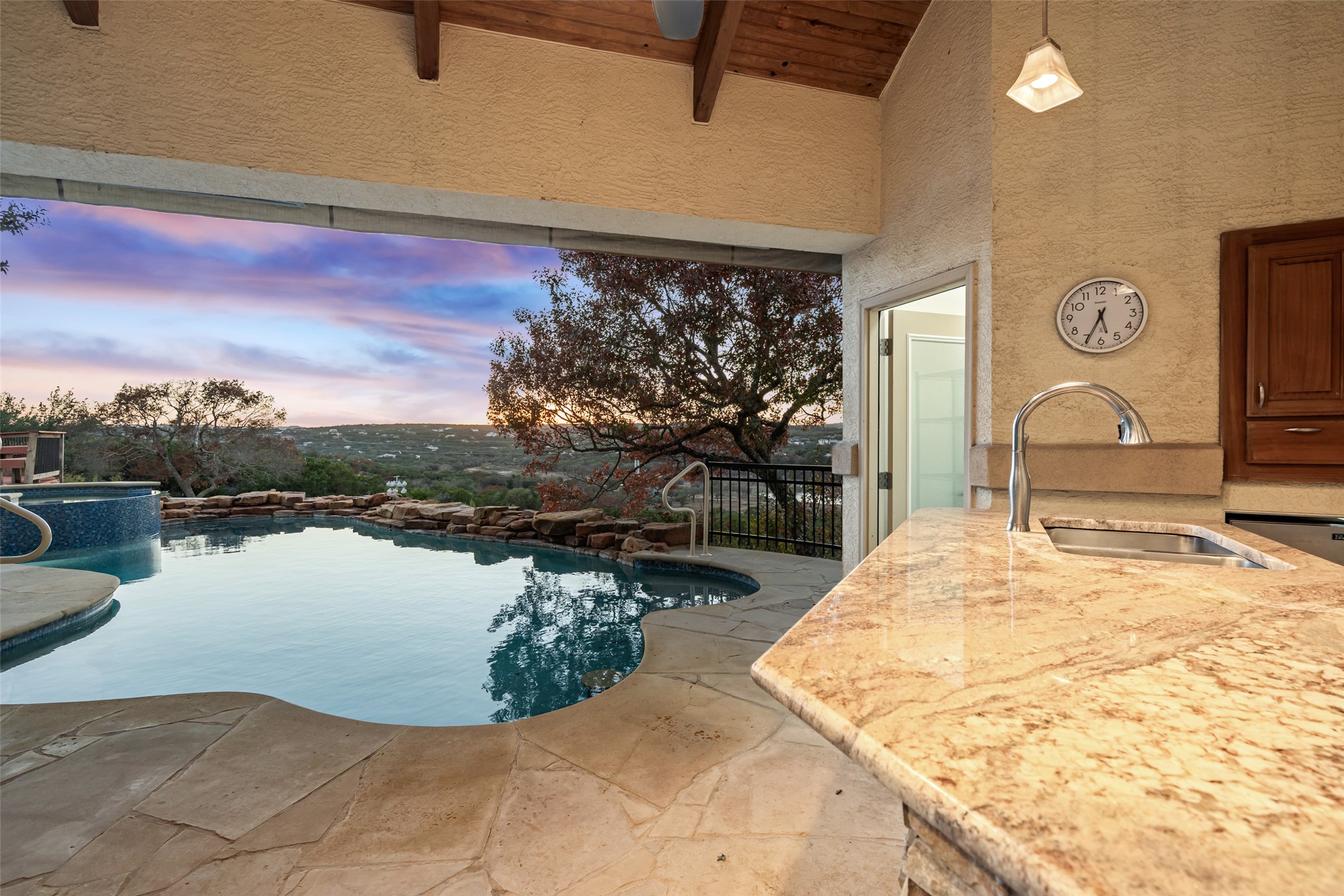 2906 Lakehurst Road Spicewood, TX 78669 - Photo 8 of 40 a view of a lake from a balcony