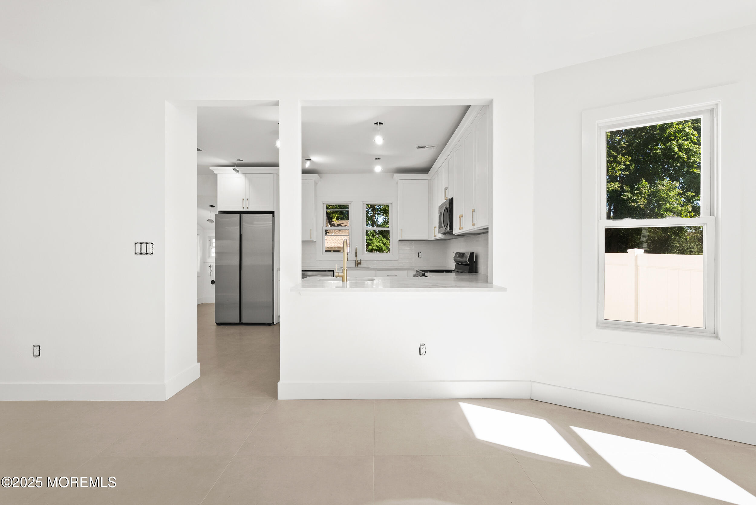 448 Monmouth Road West Long Branch, NJ 07764 - Photo 12 of 35 a view of kitchen with stainless steel appliances refrigerator oven and cabinets