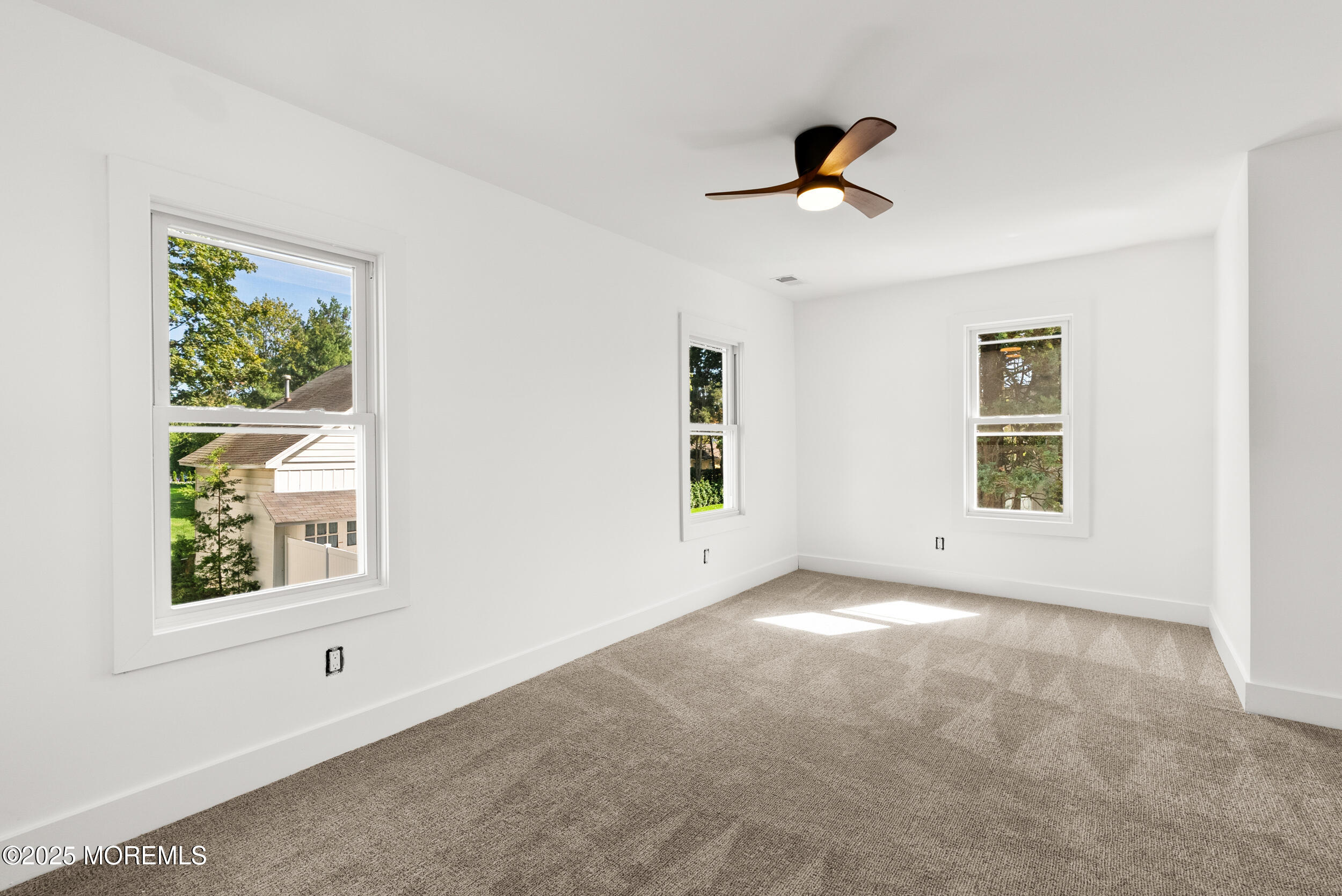 448 Monmouth Road West Long Branch, NJ 07764 - Photo 27 of 35 a view of an empty room with a window
