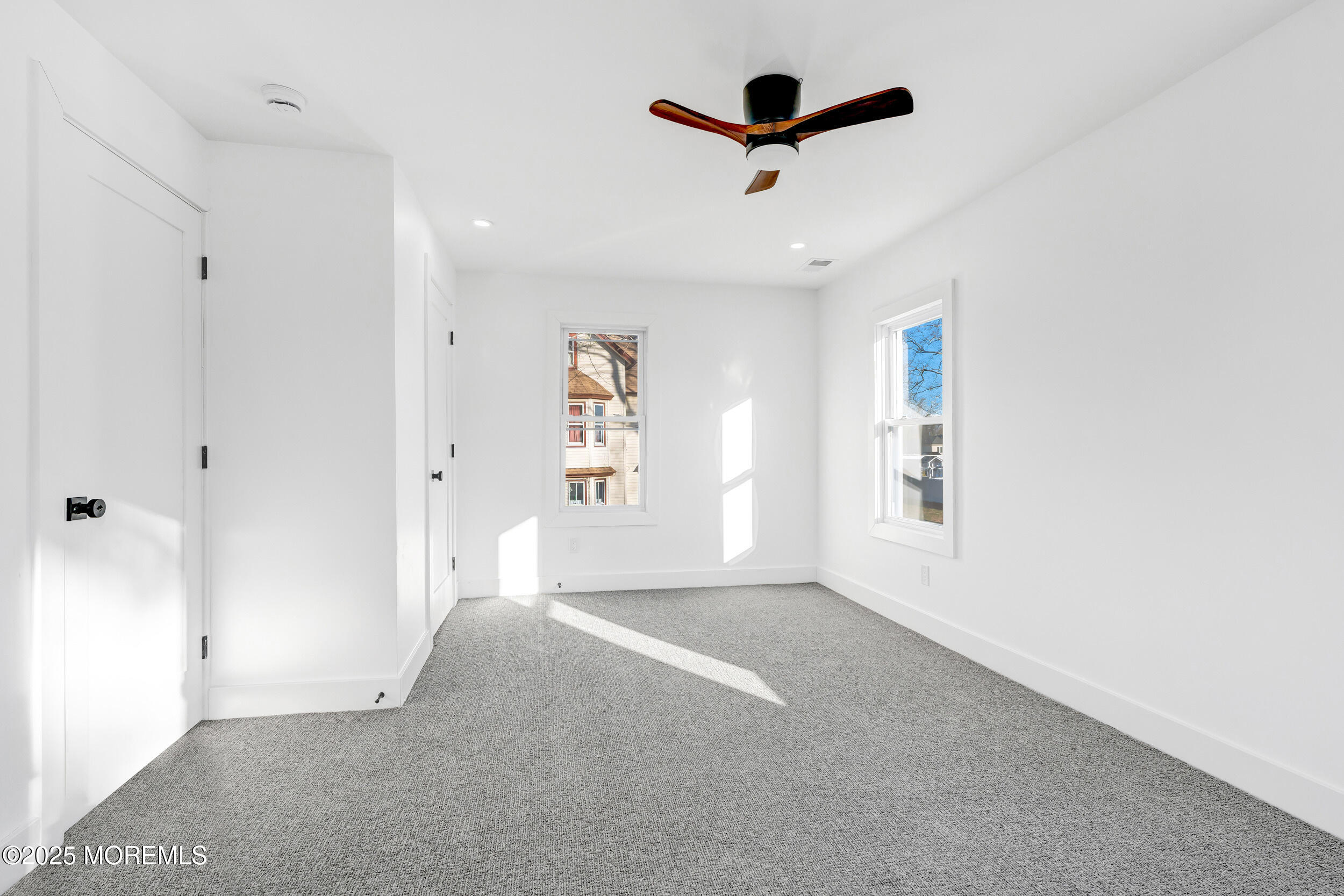 448 Monmouth Road West Long Branch, NJ 07764 - Photo 47 of 51 an empty room with windows and fan