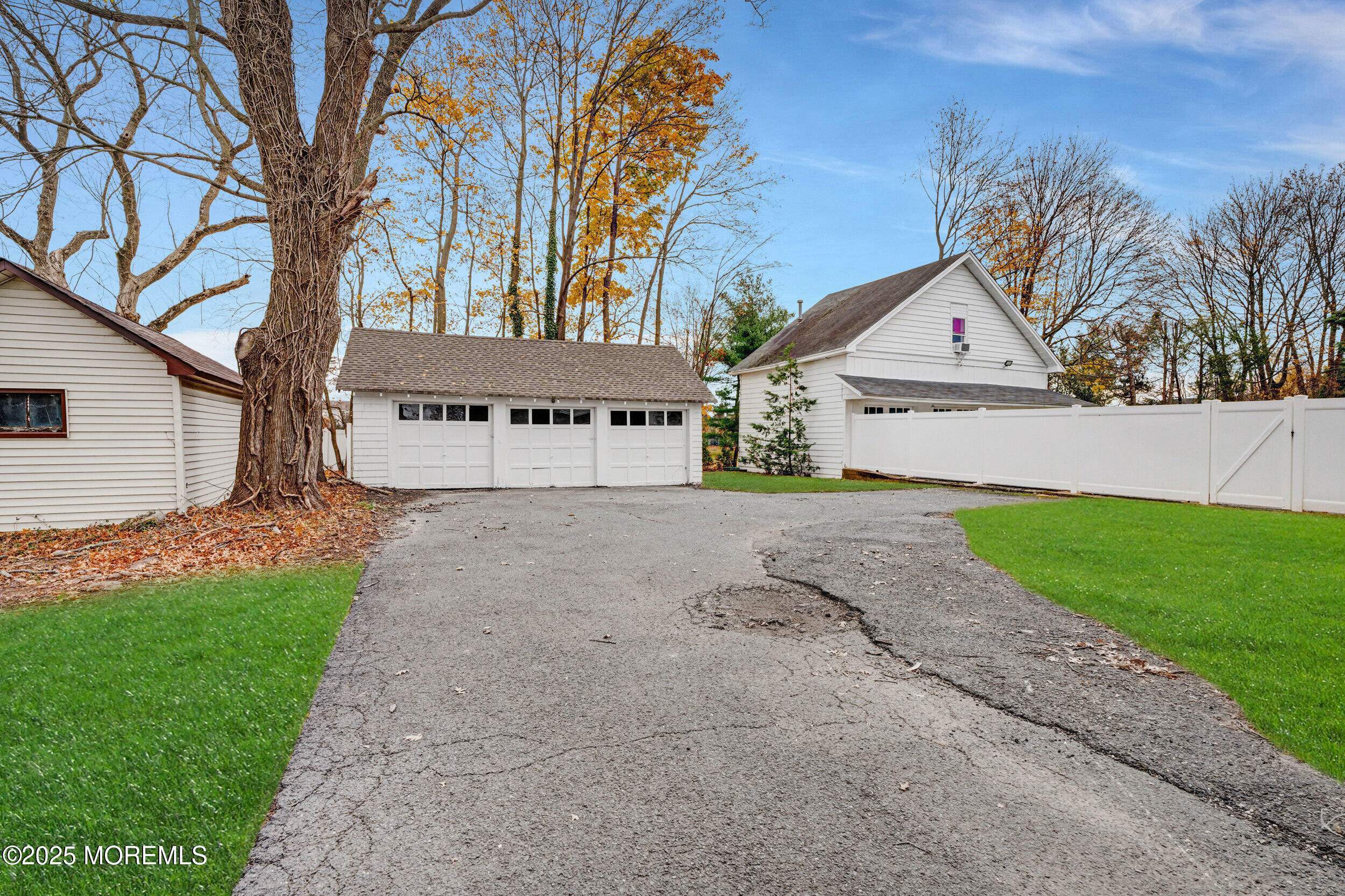 448 Monmouth Road West Long Branch, NJ 07764 - Photo 50 of 51 a front view of a house with garden