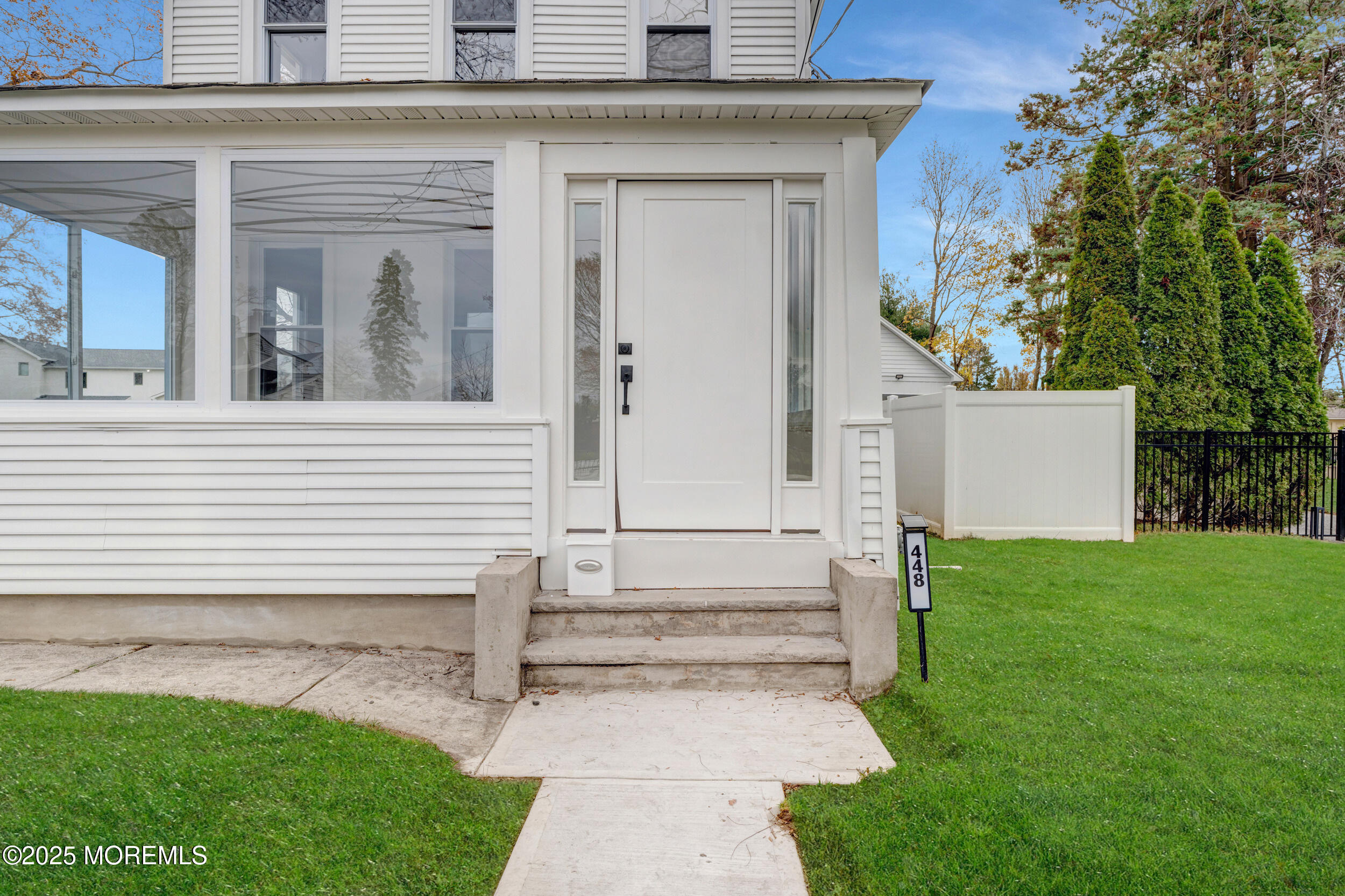 448 Monmouth Road West Long Branch, NJ 07764 - Photo 6 of 35 front view of a house with a yard