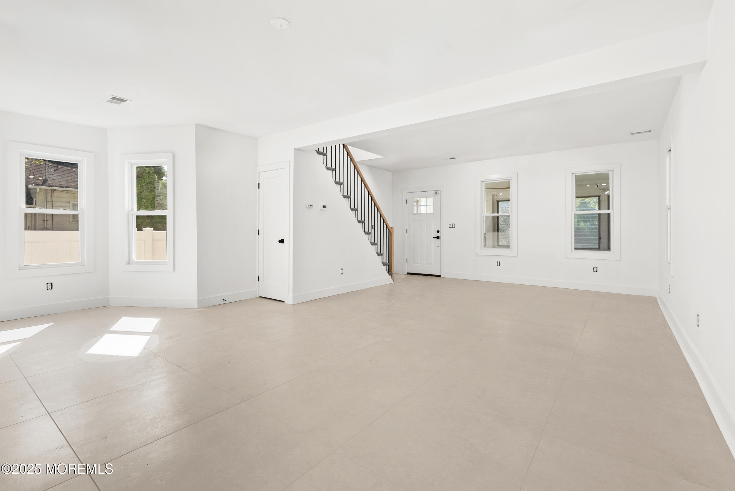 448 Monmouth Road West Long Branch, NJ 07764 - Photo 9 of 35 an empty room with windows