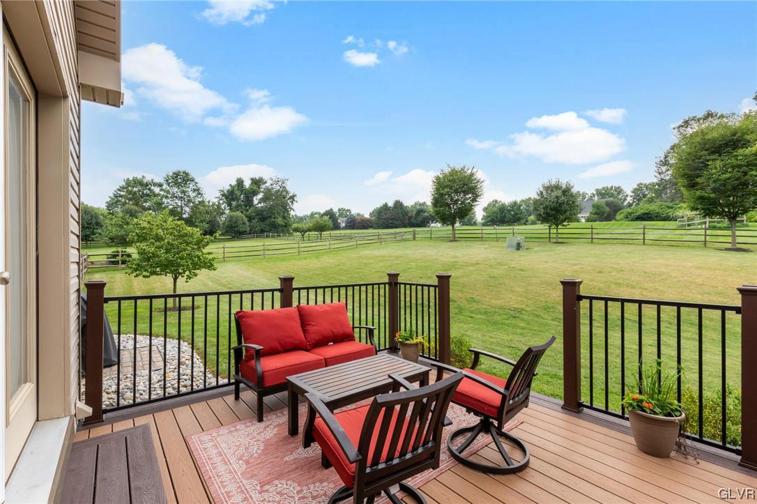 315 Bougher Hill Road Easton, PA 18042 - Photo 16 of 20 a view of a chair and table on the wooden floor