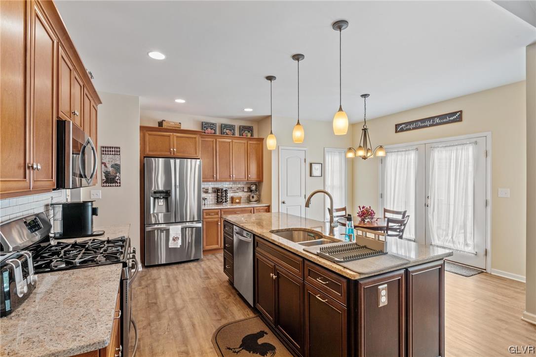315 Bougher Hill Road Easton, PA 18042 - Photo 3 of 20 a kitchen with stainless steel appliances a sink stove and refrigerator