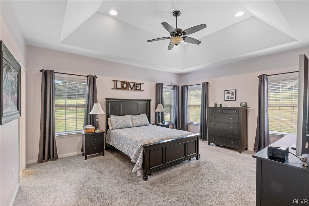 315 Bougher Hill Road Easton, PA 18042 - Photo 8 of 20 a bedroom with a bed a couch and a large window