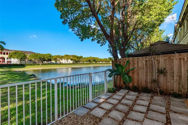 a view of a wrought iron bridge