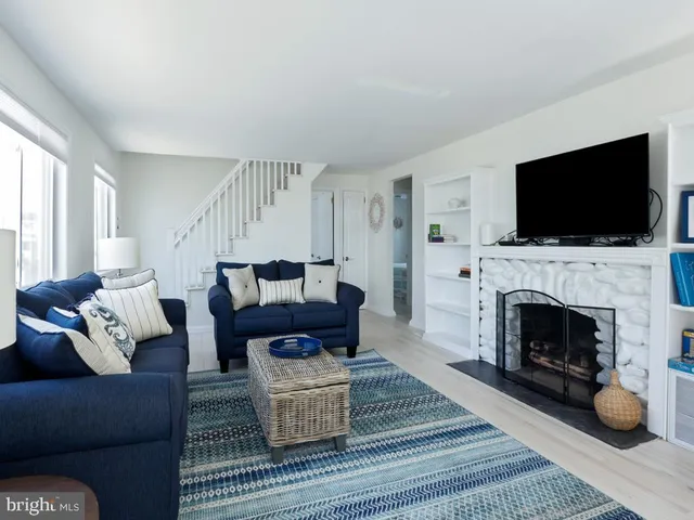 a bathroom with a toilet sink and a mirror