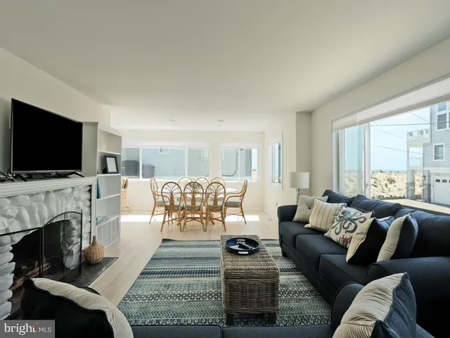 a bedroom with two beds and a window