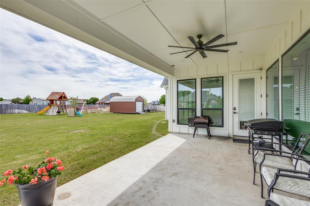 2255 County Road 377 Van Alstyne, TX 75495 - Photo 28 of 32 Large covered patio with ceiling fan