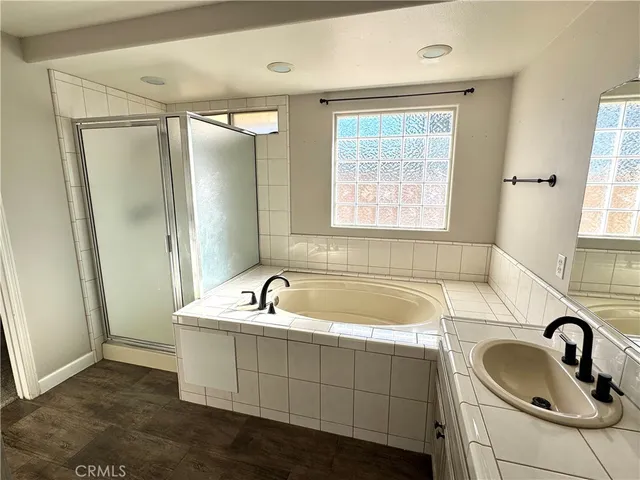 a bathroom with a sink and a bathtub