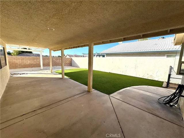 a view of a backyard with porch
