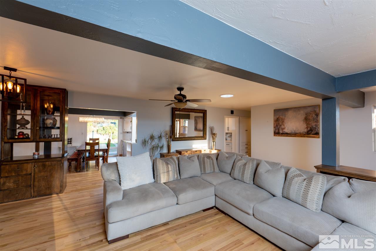 630 Cardinal Way Reno, NV 89509 - Photo 8 of 35 a living room with furniture and wooden floor