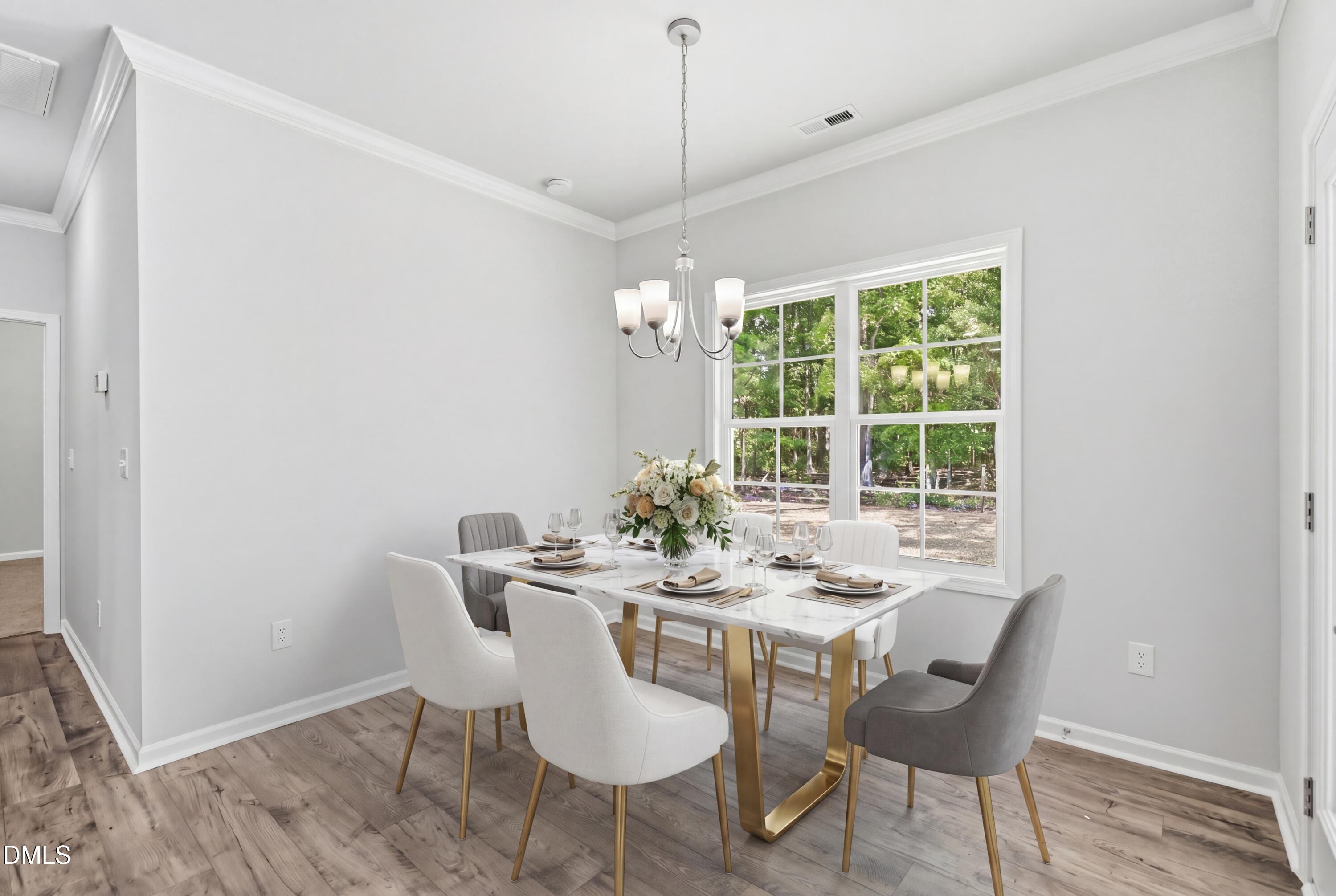 191 Nectar Lane Bunnlevel, NC 28323 - Photo 17 of 35 a view of a dining room with furniture window and outside view