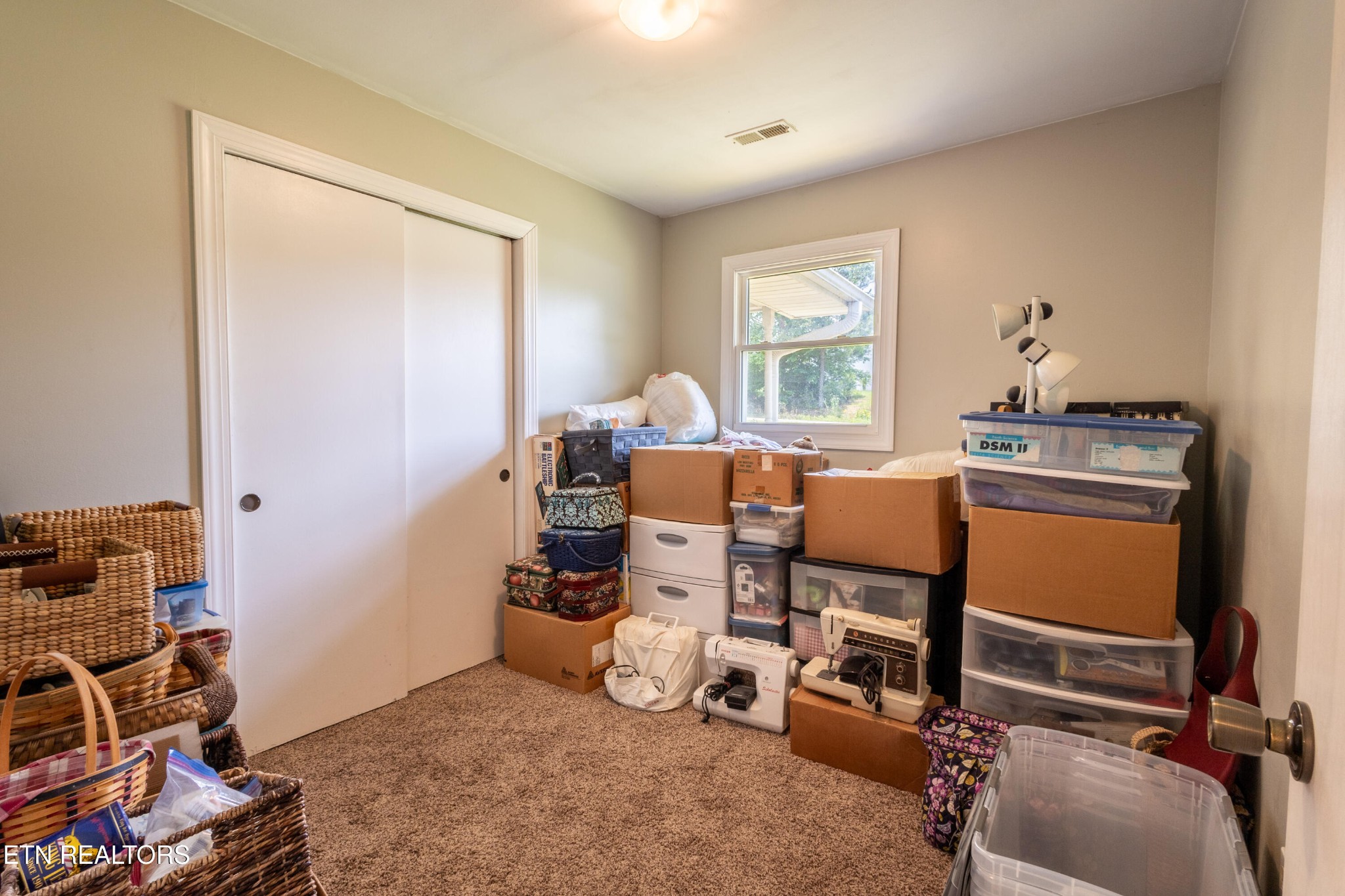 6119 Ridgeview Road Knoxville, TN 37918 - Photo 7 of 16 a room with furniture and a window