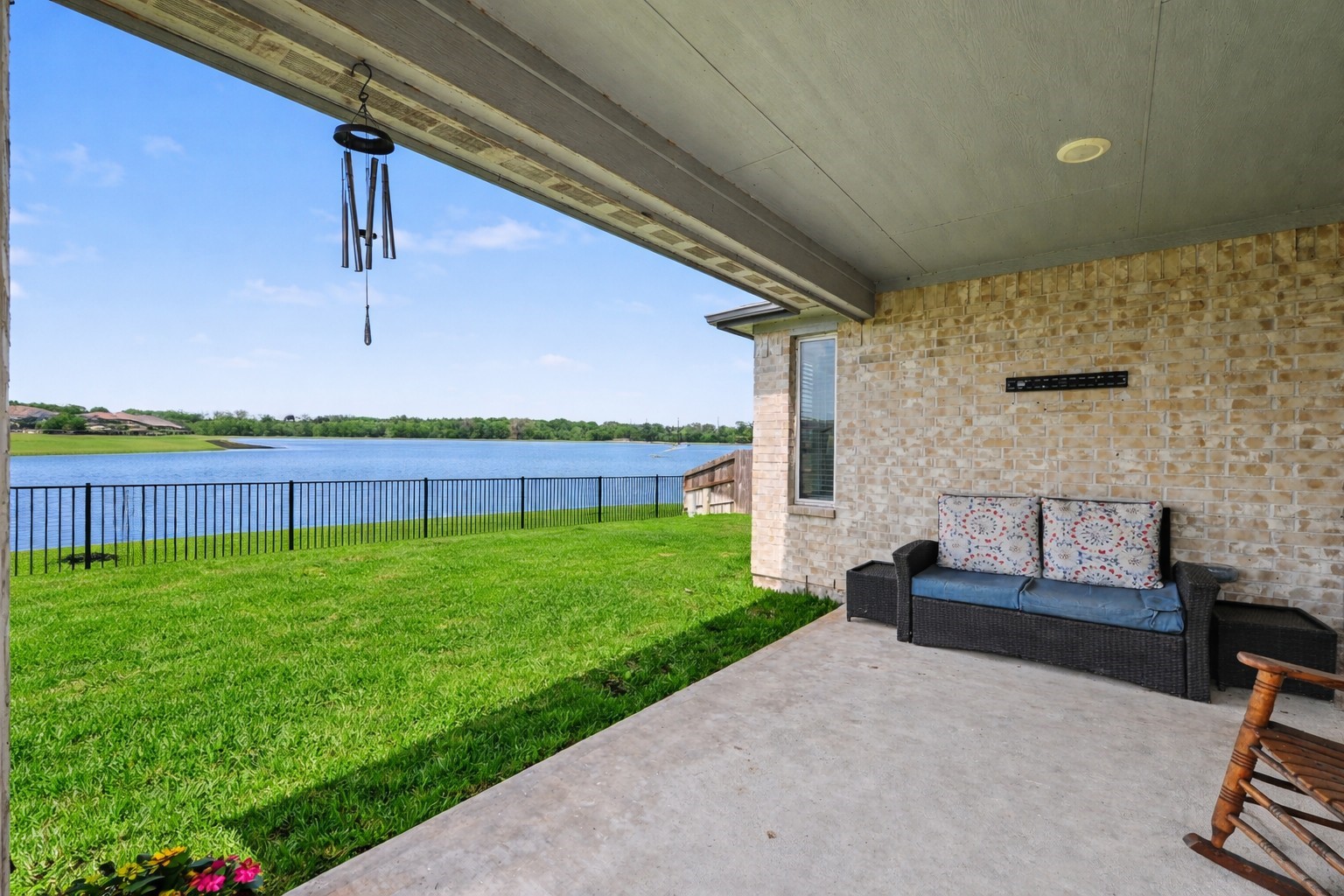 5842 Wayne Way Rosenberg, TX 77471 - Photo 13 of 17 Huge covered patio with relaxing water view