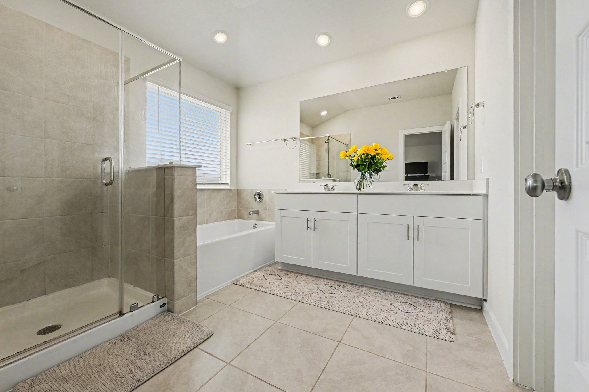 5842 Wayne Way Rosenberg, TX 77471 - Photo 9 of 17 Primary Bathroom with double sinks & natural light