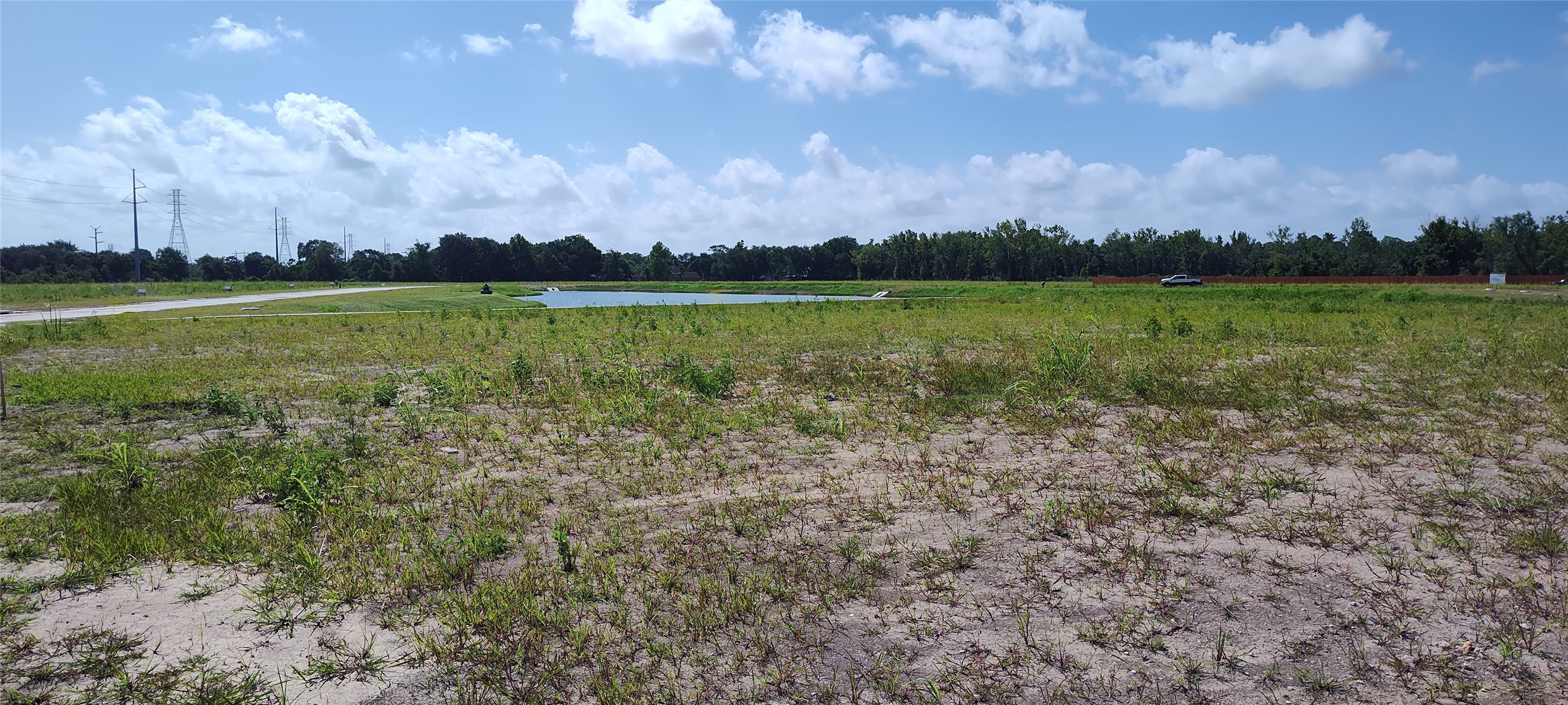 15423 Pinehurst Lane Santa Fe, TX 77517 - Photo 6 of 10 a view of an ocean and a yard