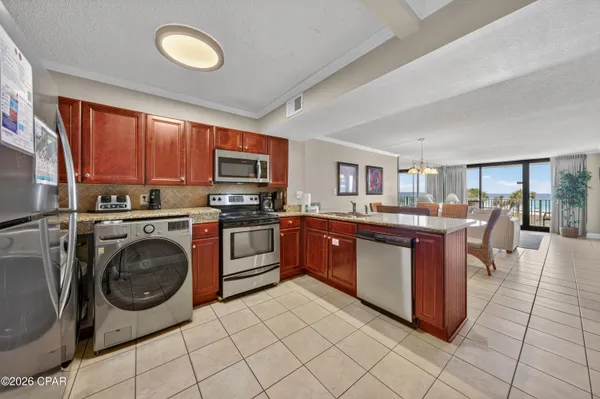$375,000 | 7205 Thomas Drive, Unit A209, Panama City Beach, FL 32408