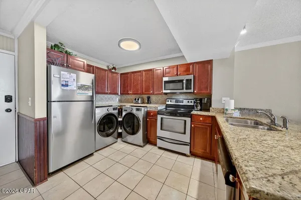 $375,000 | 7205 Thomas Drive, Unit A209, Panama City Beach, FL 32408