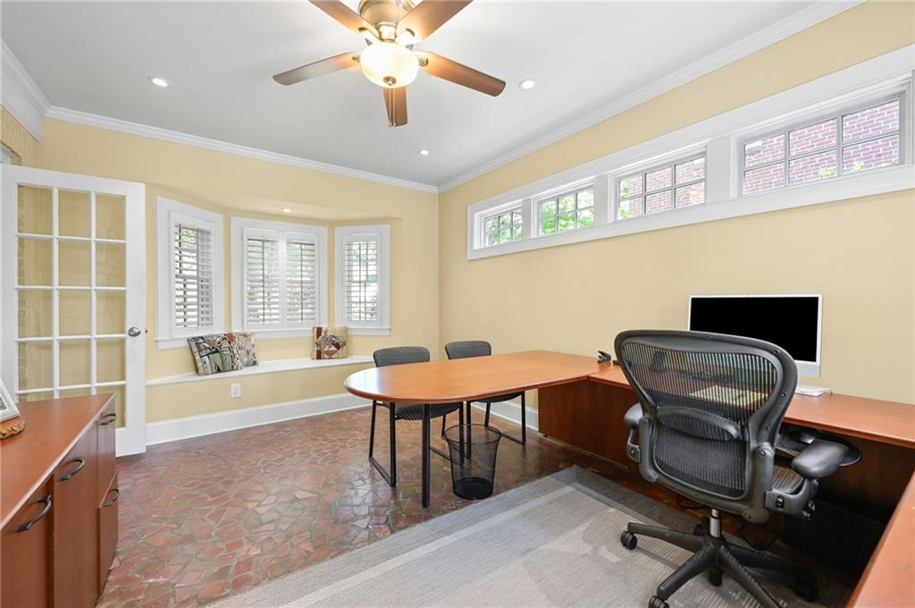 1735 Johnson Road Northeast Atlanta, GA 30306 - Photo 11 of 54 a view of a workspace with furniture and a window