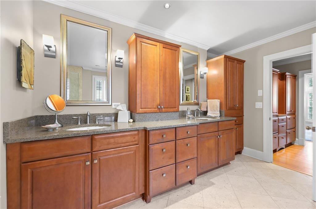 1735 Johnson Road Northeast Atlanta, GA 30306 - Photo 30 of 54 a bathroom with a granite countertop sink mirror and double
