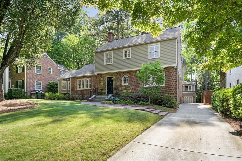 1735 Johnson Road Northeast Atlanta, GA 30306 - Photo 4 of 54 a view of a house with a yard patio and a patio
