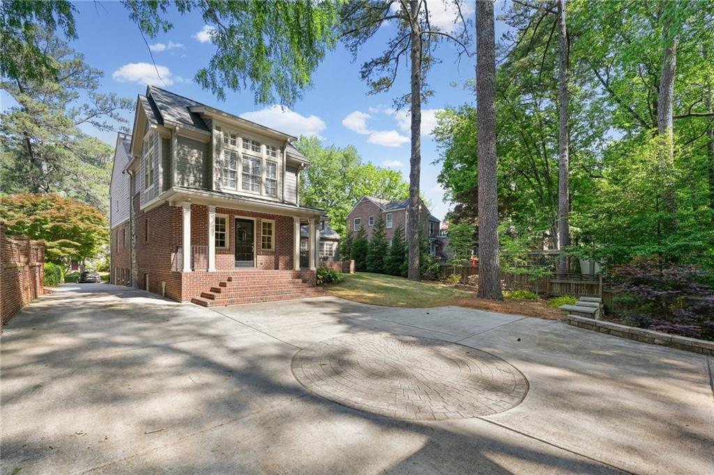 1735 Johnson Road Northeast Atlanta, GA 30306 - Photo 44 of 54 a view of a house with a yard and tree s
