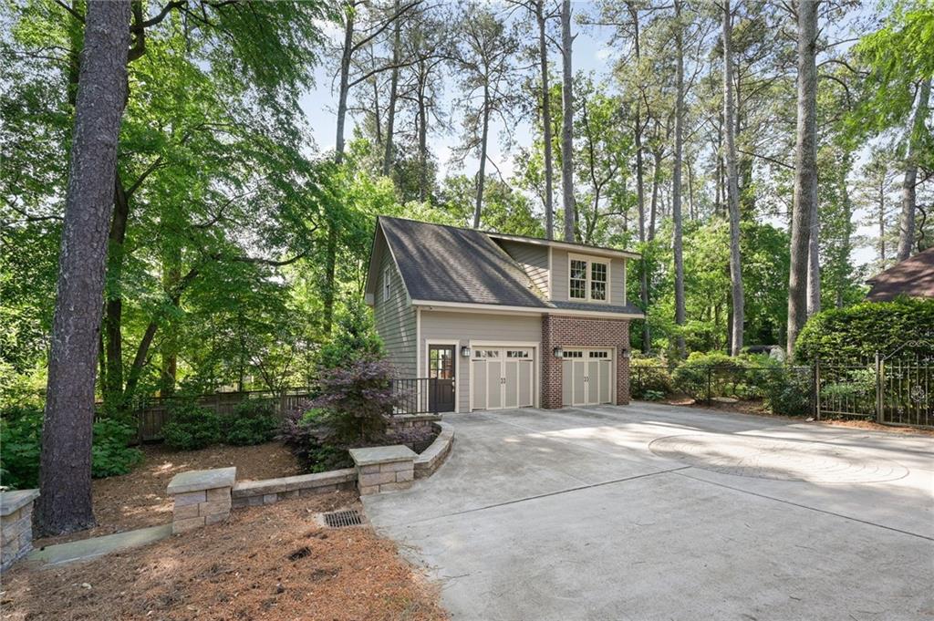 1735 Johnson Road Northeast Atlanta, GA 30306 - Photo 46 of 54 front view of a house with a yard