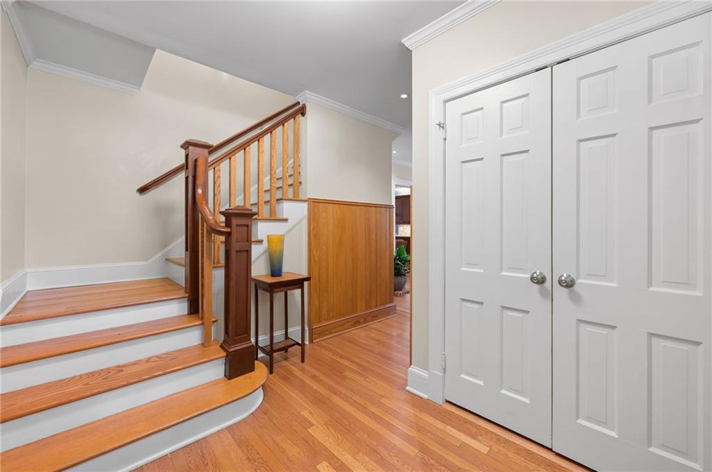 1735 Johnson Road Northeast Atlanta, GA 30306 - Photo 5 of 54 a view of entryway with wooden floor and stairs