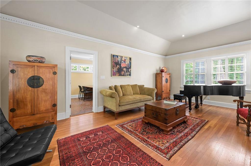 1735 Johnson Road Northeast Atlanta, GA 30306 - Photo 7 of 54 a living room with furniture and a window