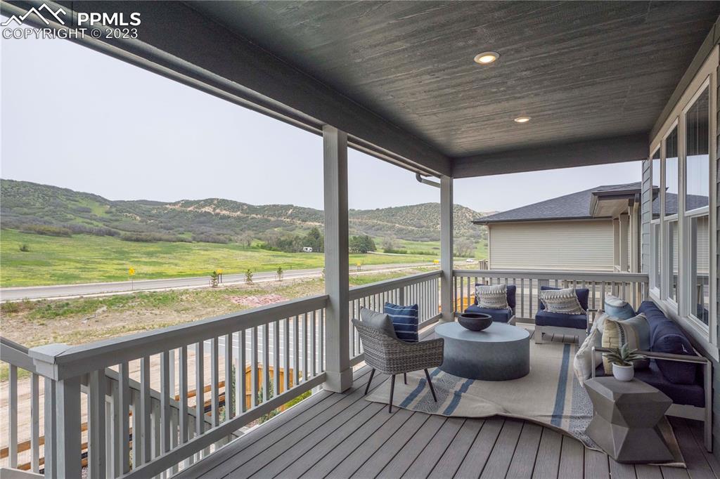 631 Felicity Loop Castle Rock, CO 80109 - Photo 30 of 33 a balcony with furniture and garden view