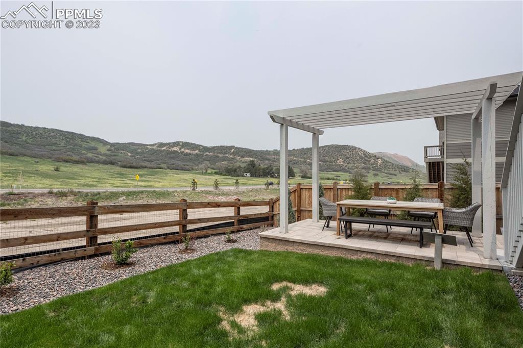 631 Felicity Loop Castle Rock, CO 80109 - Photo 32 of 33 a view of a garden with lawn chairs