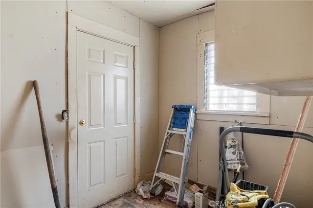 a view of a room with windows