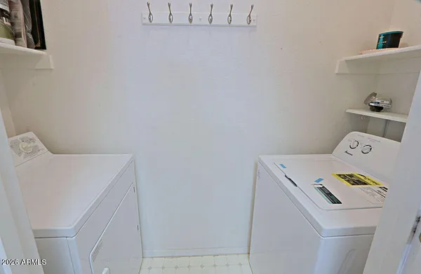 a bathroom with a sink vanity and a mirror