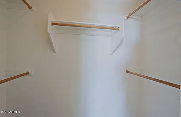 an aerial view of a house with a yard and outdoor seating