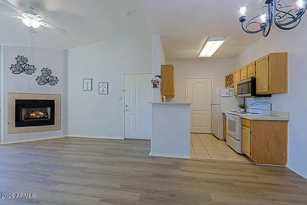 a kitchen with a stove and a microwave