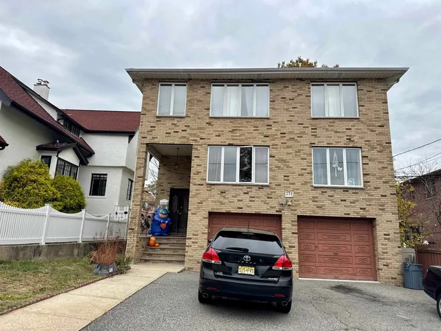 a car parked in front of a house