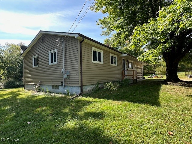 3216 South Ridge Road West Ashtabula, OH 44004 - Photo 17 of 17 View of property exterior with a lawn