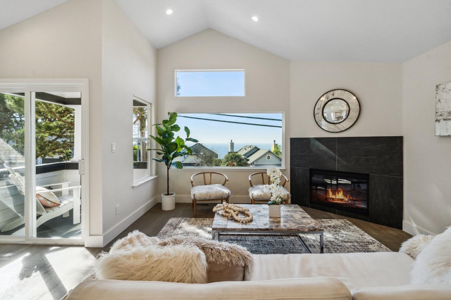 539 Monterey Road Pacifica, CA 94044 - Photo 3 of 38 a living room with furniture and a fireplace