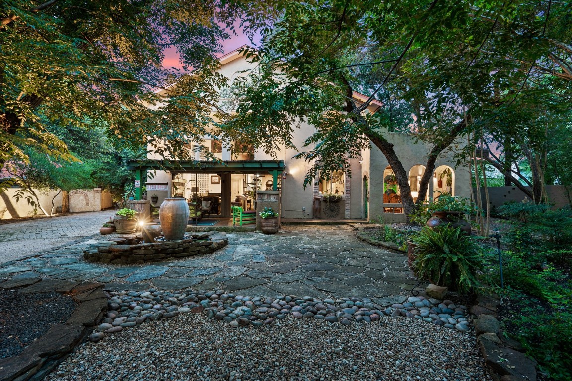 5903 Median Road Austin, TX 78734 - Photo 1 of 1 a front view of a house with a garden