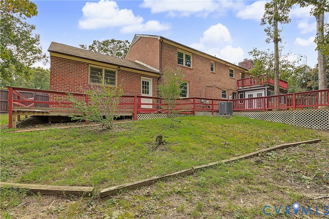 13310 Gladehill Road Chester, VA 23831 - Photo 39 of 41 Brick exterior, multiple windows, multi-level wood
