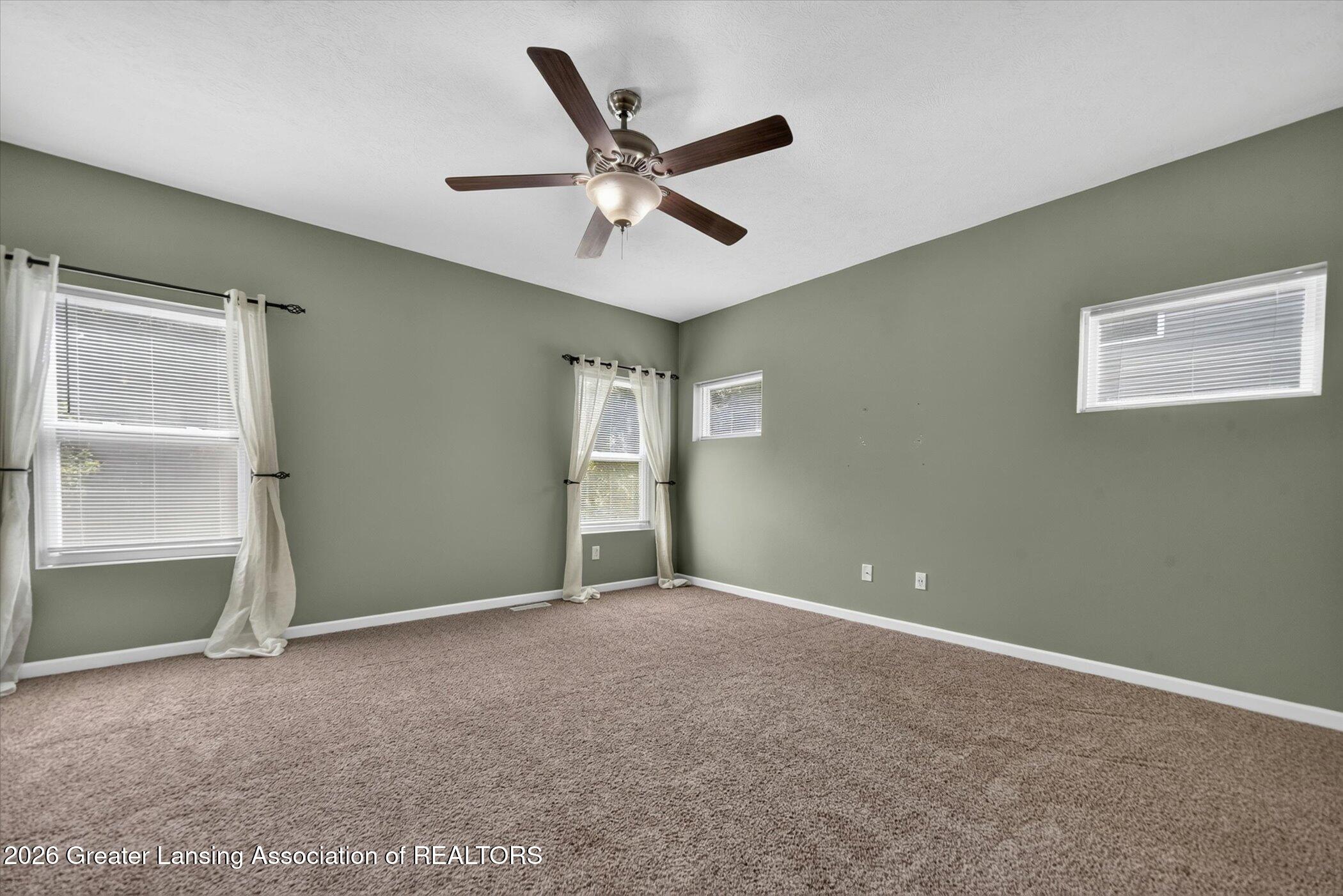 47 Lake Ridge Drive Mason, MI 48854 - Photo 8 of 53 08-47-Lake-Ridge-Dr-Windowstill