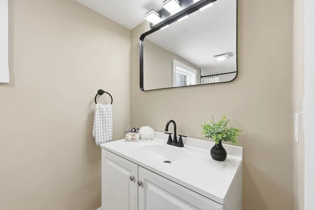 a view of bathroom with dual sinks