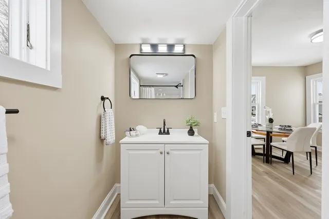 a view of an entryway with wooden floor